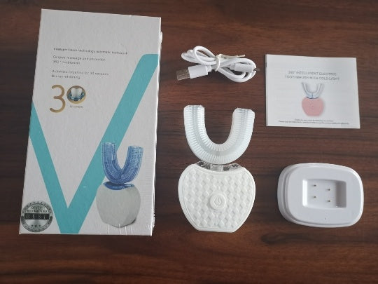 a white device with a box and a charger