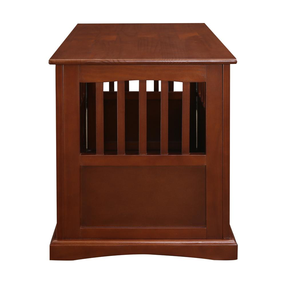 a wooden dog kennel with a door