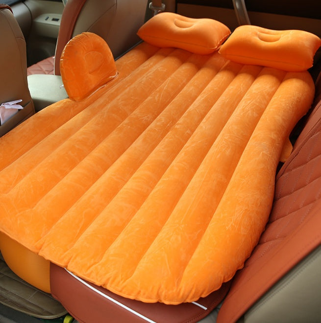 an inflatable mattress in the back of a car