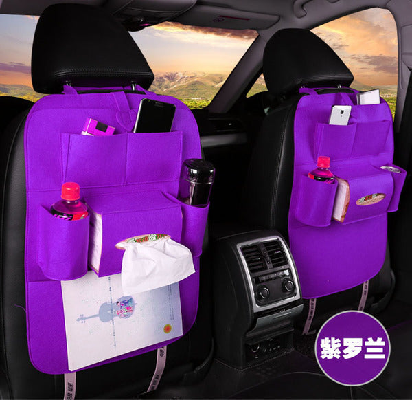 a purple car seat with a purple pocket
