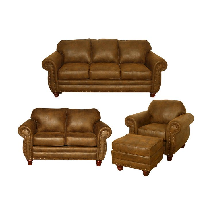 a group of brown couches
