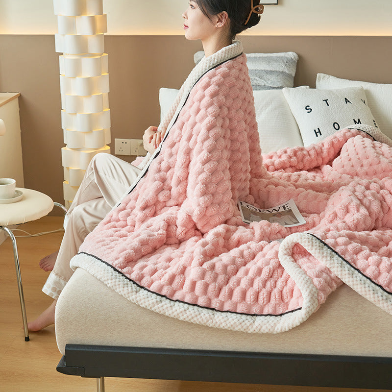 a woman sitting on a bed