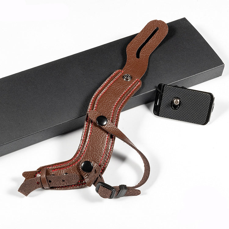 a brown leather strap with a lighter