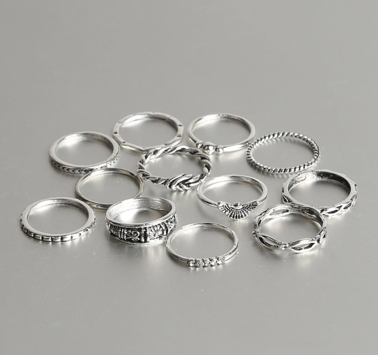 a group of silver rings