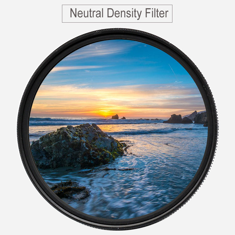 a circular camera lens with a sunset over the ocean
