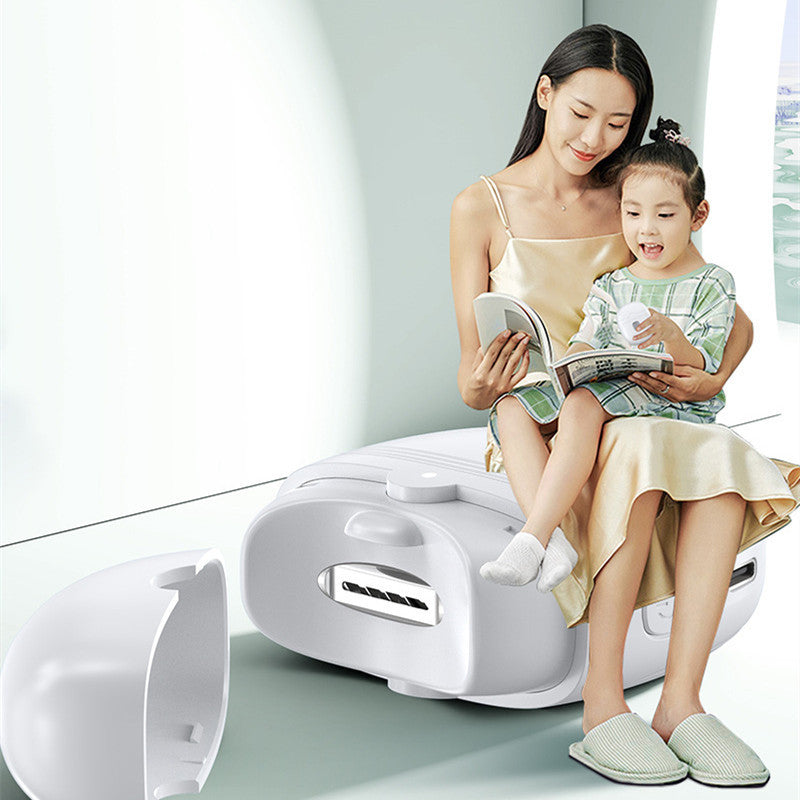 a woman and a child sitting on a suitcase