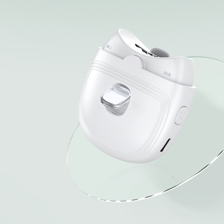 a white device on a glass stand