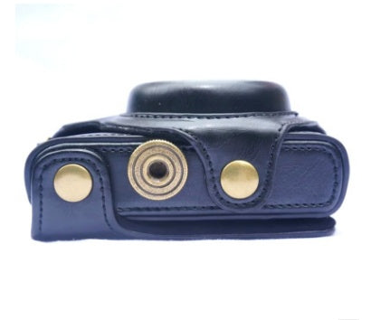 a black leather case with a metal button