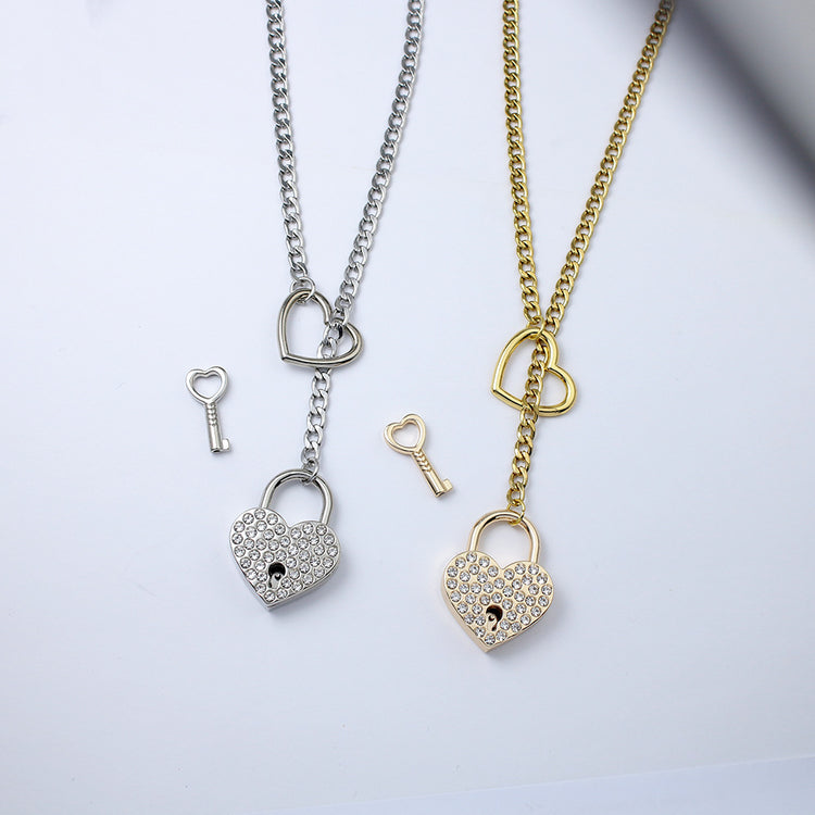 a group of necklaces with keys and heart shaped locks