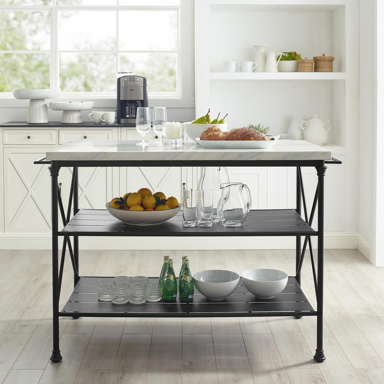a kitchen with a table and shelves