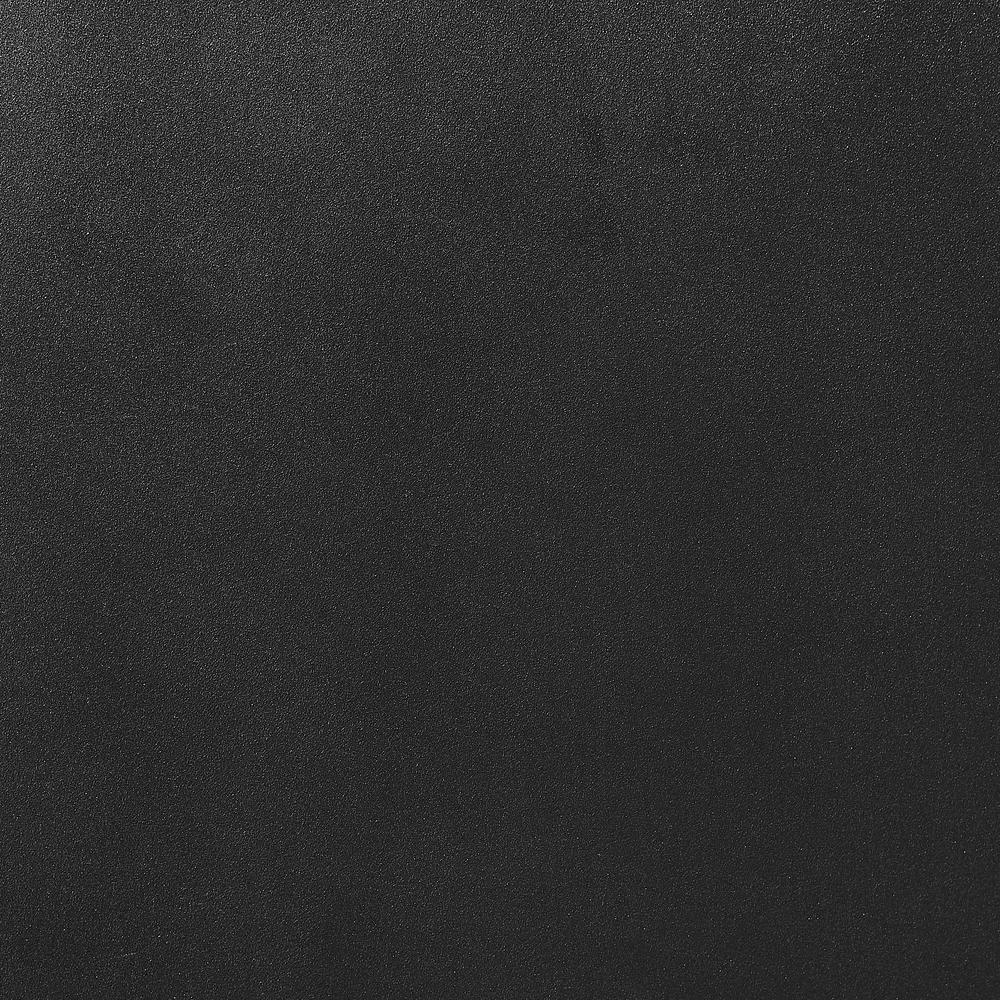 a black surface with small dots