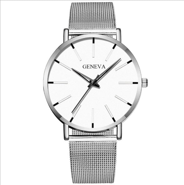 a silver watch with a white face