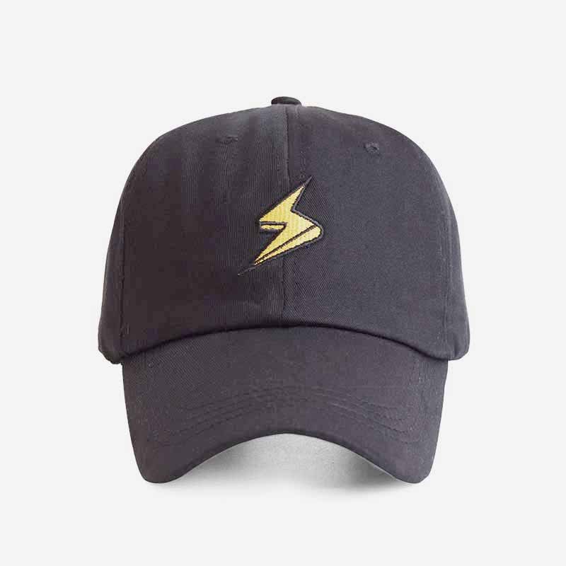 a black baseball hat with a yellow lightning bolt on it