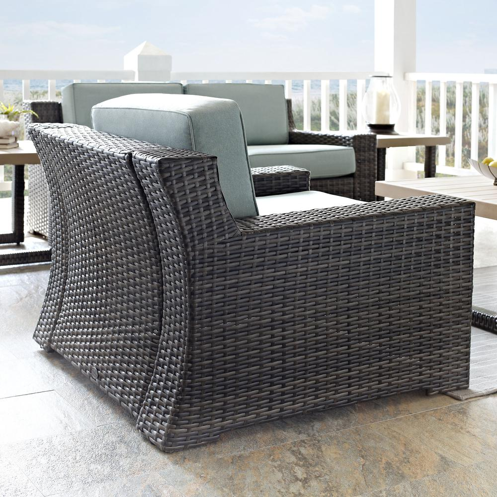 a chair and table on a patio