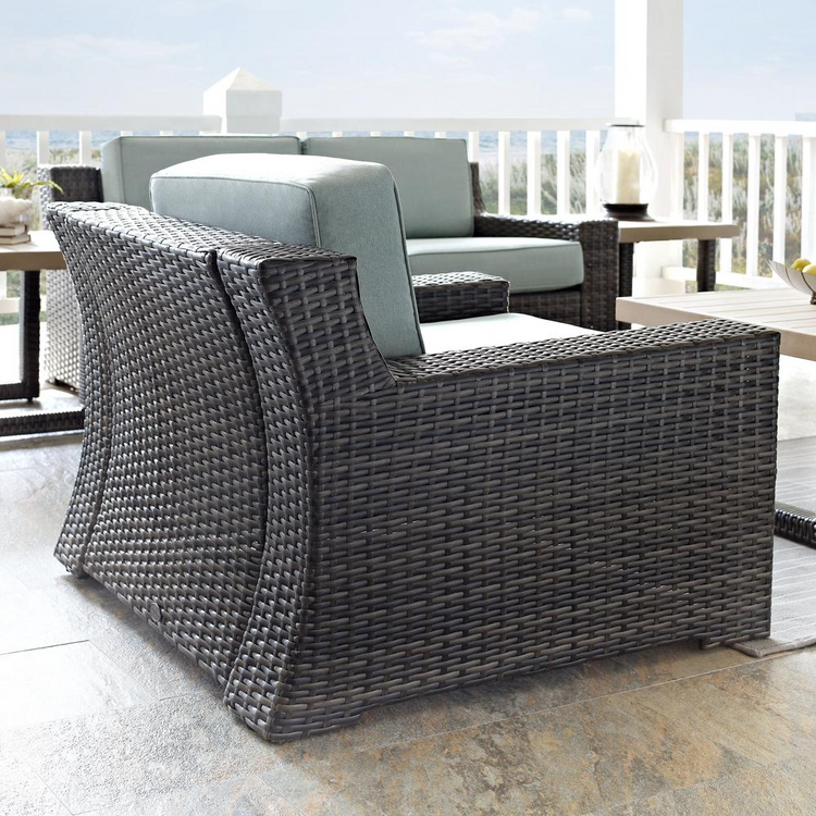 a chair and table on a patio