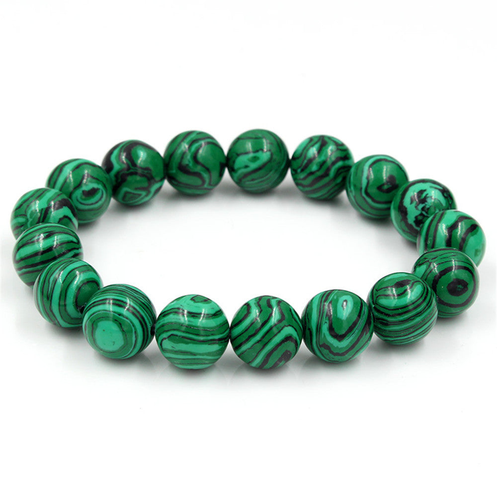 a green and black beaded bracelet
