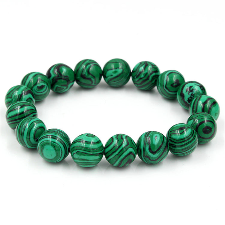 a green and black beaded bracelet
