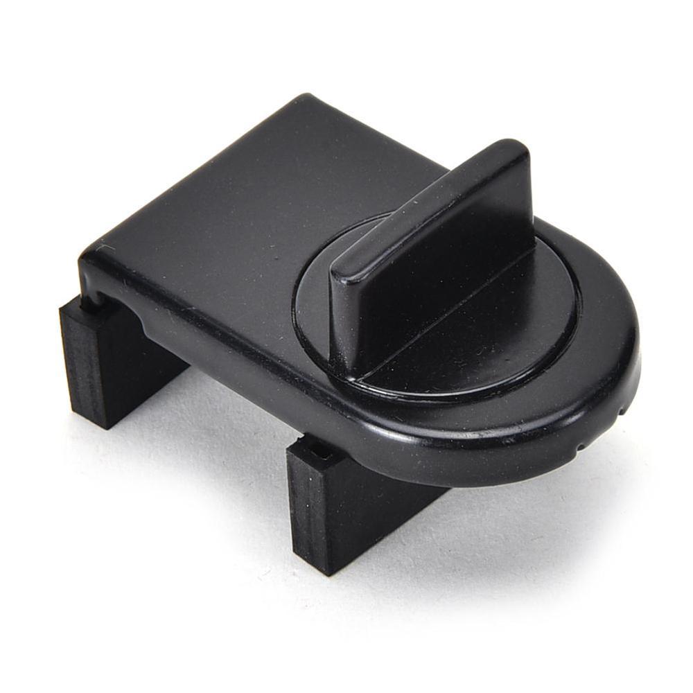 a black plastic object with a handle