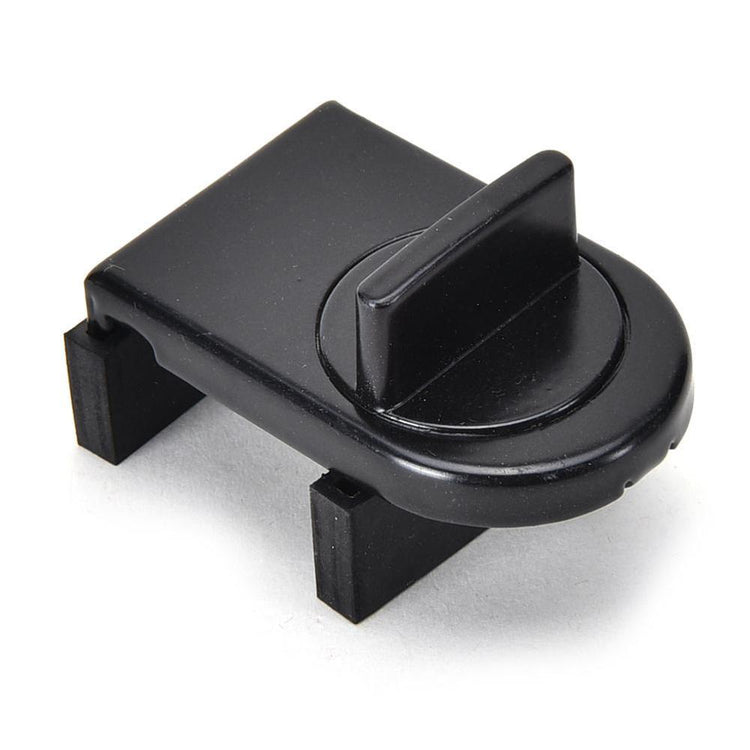 a black plastic object with a handle
