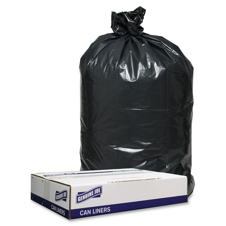 a black garbage bag next to a white box