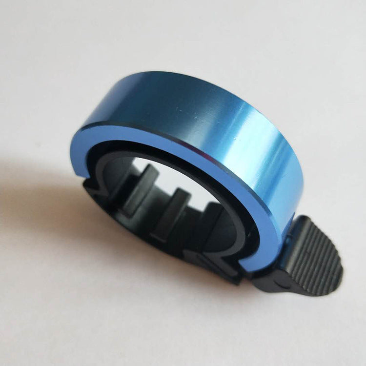 a blue tape roll on a white surface