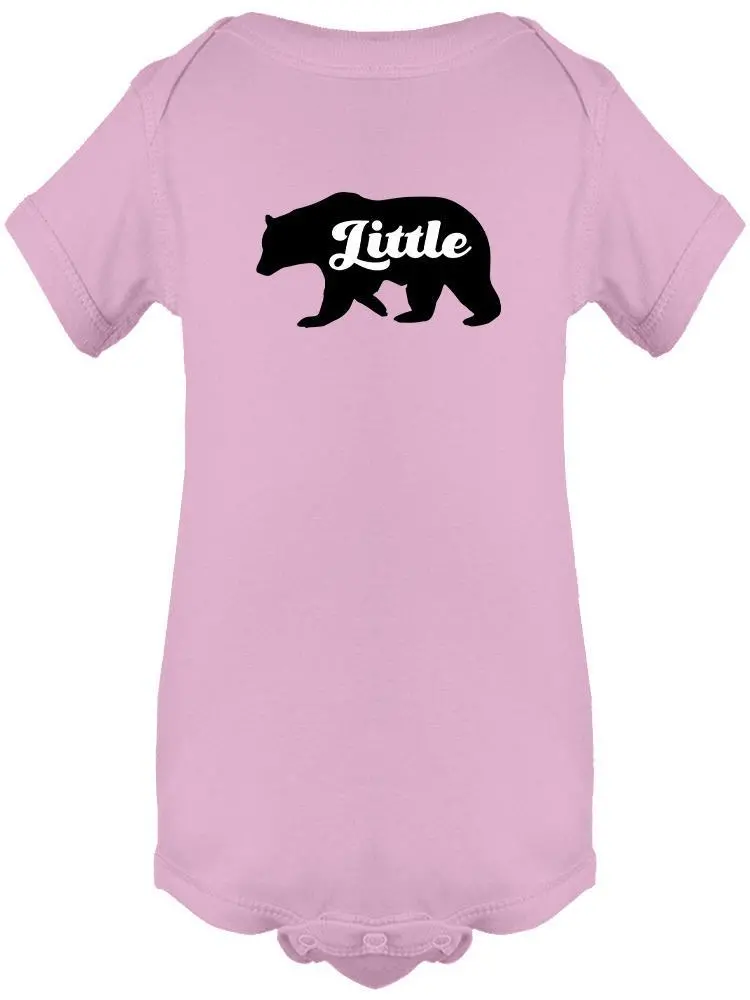 a pink shirt with a bear on it