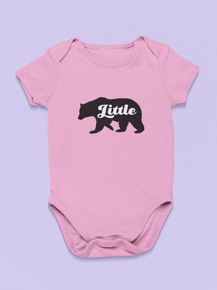 a pink baby bodysuit with a bear on it