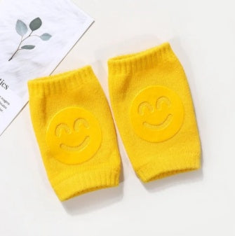 yellow socks with smiley faces on them