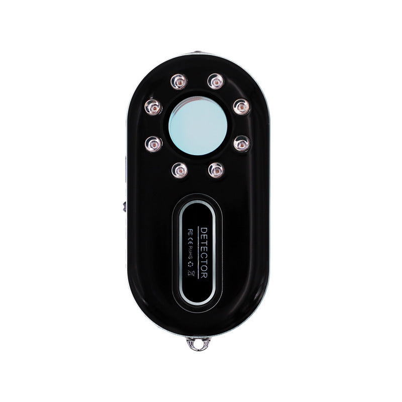 a black object with a round button