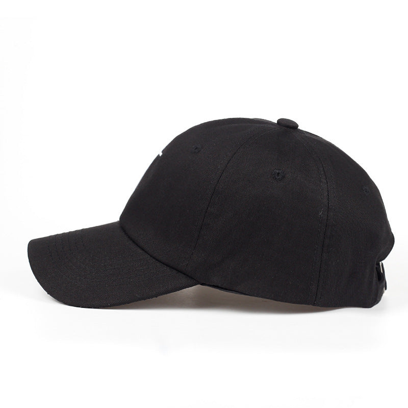 a black baseball cap on a white background