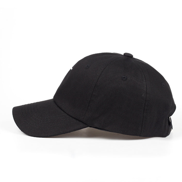 a black baseball cap on a white background
