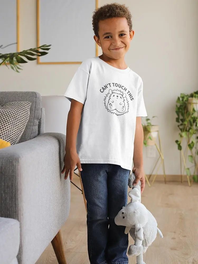 a boy holding a stuffed animal