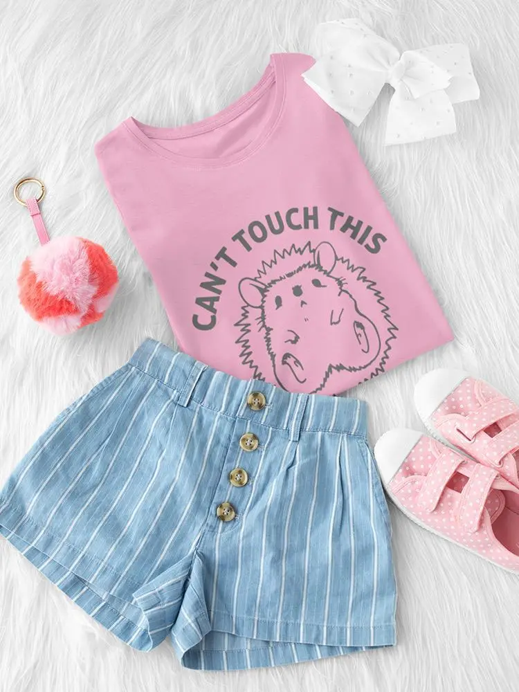 a pink shirt and shorts and shoes