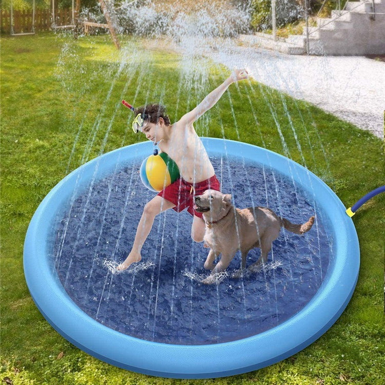 a boy and dog in a water pool