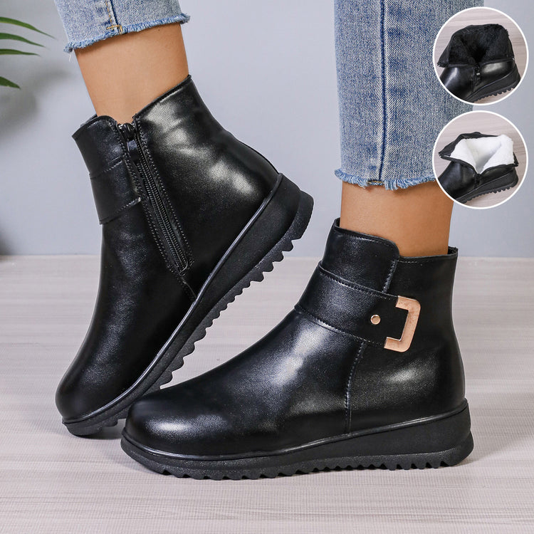 a person wearing black boots