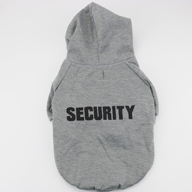 a grey dog coat with black text on it