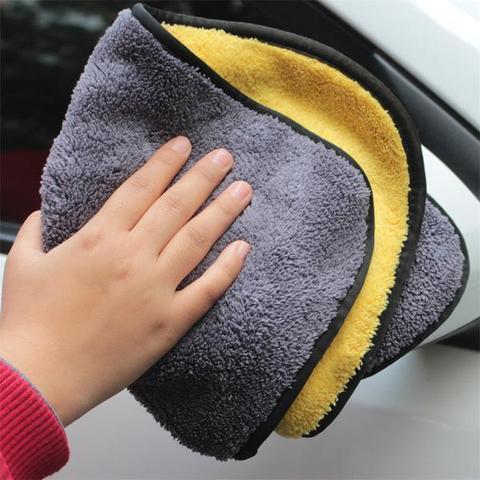 a hand holding a towel