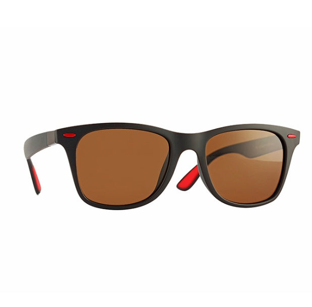 a black sunglasses with brown lenses