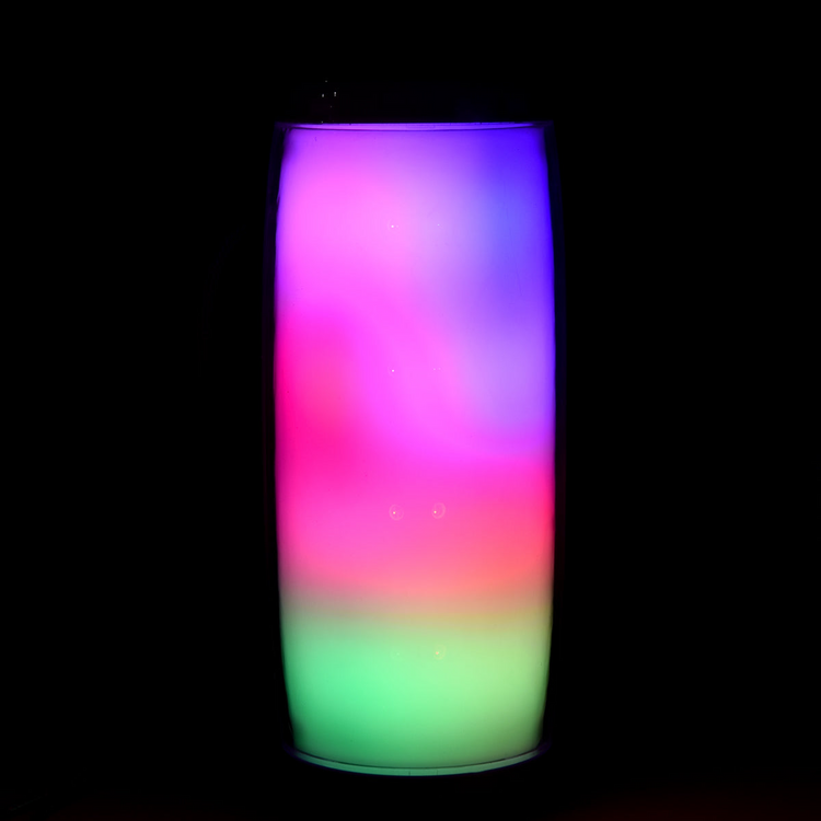 a colorful light in a glass container