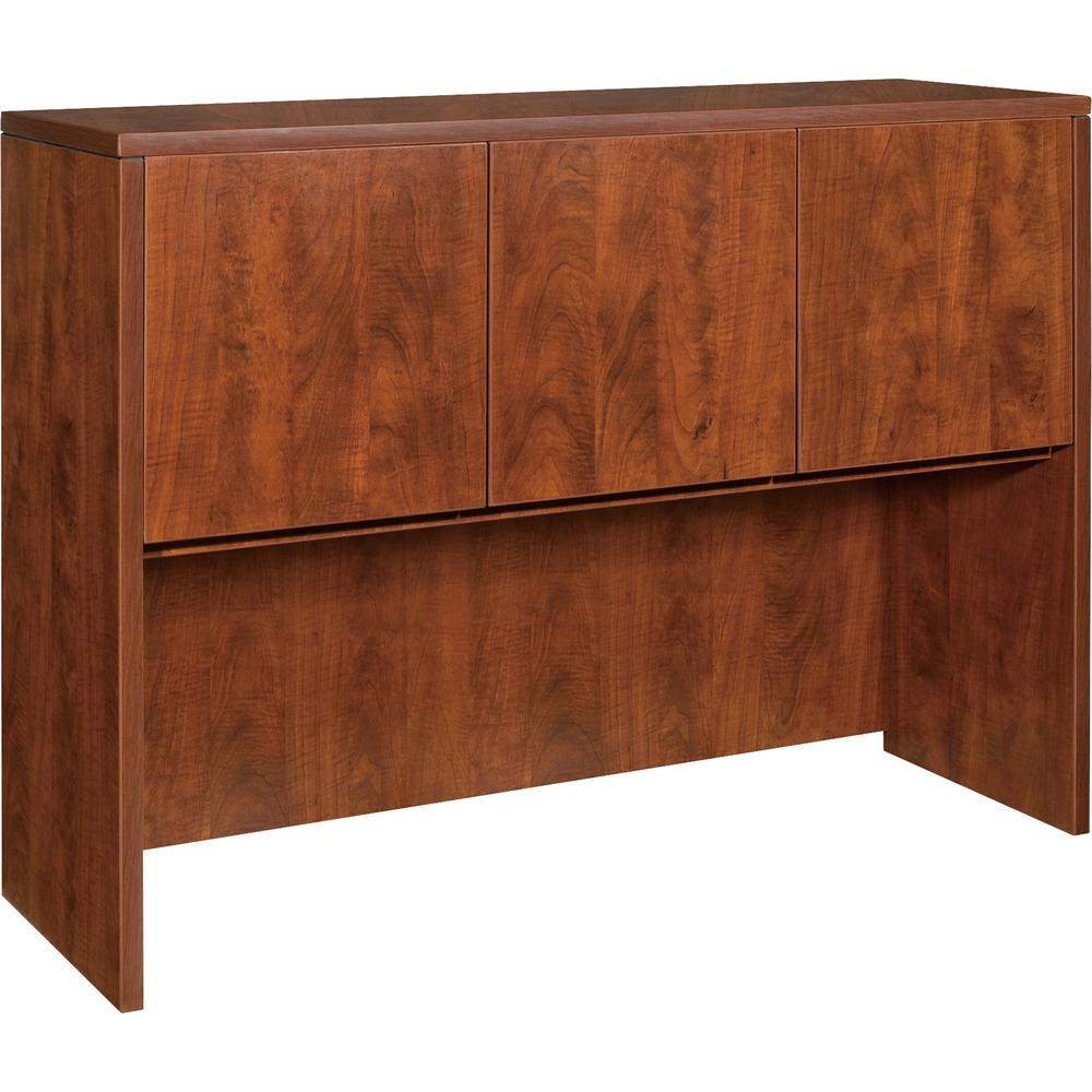 a wooden cabinet with three doors