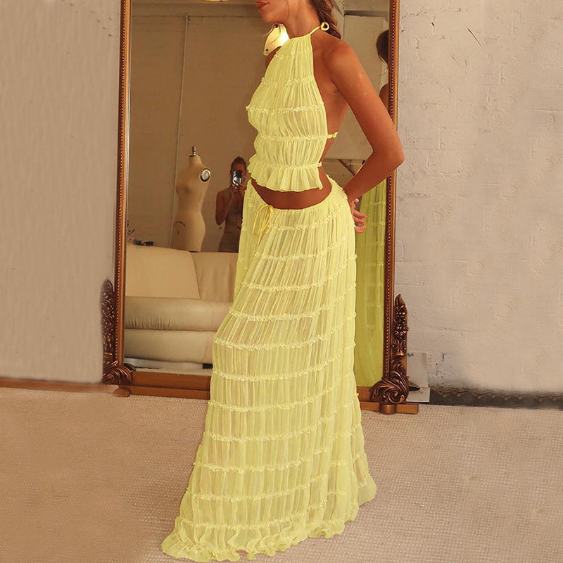 a woman in a yellow dress