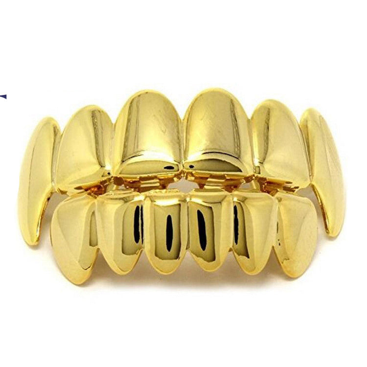 a gold teeth on a white background