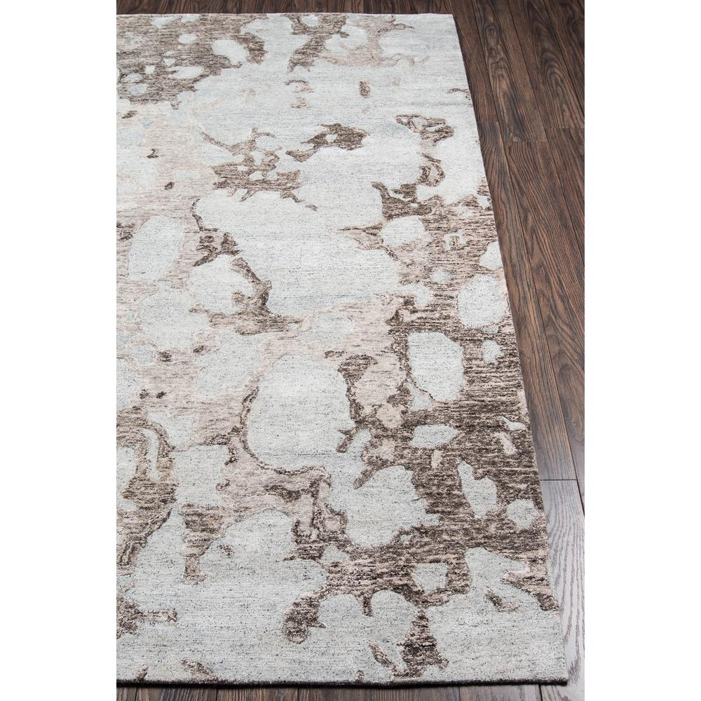 a rug on a wood floor