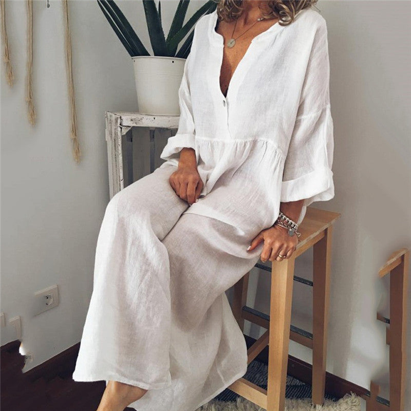 a woman sitting on a stool