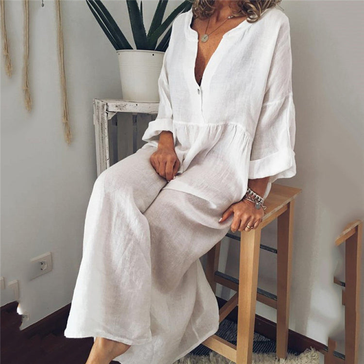 a woman sitting on a stool