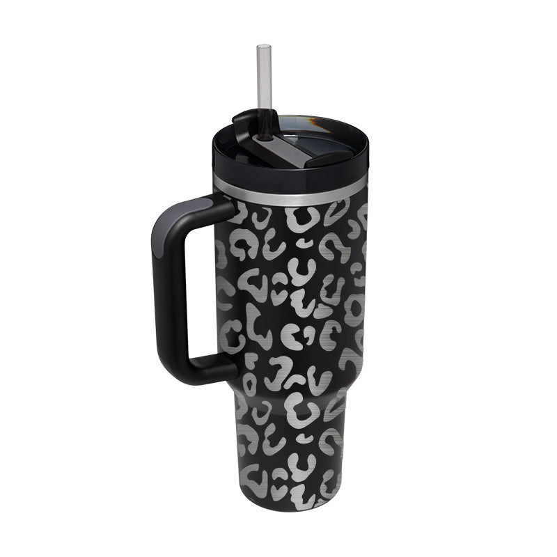 a black and white leopard print coffee mug