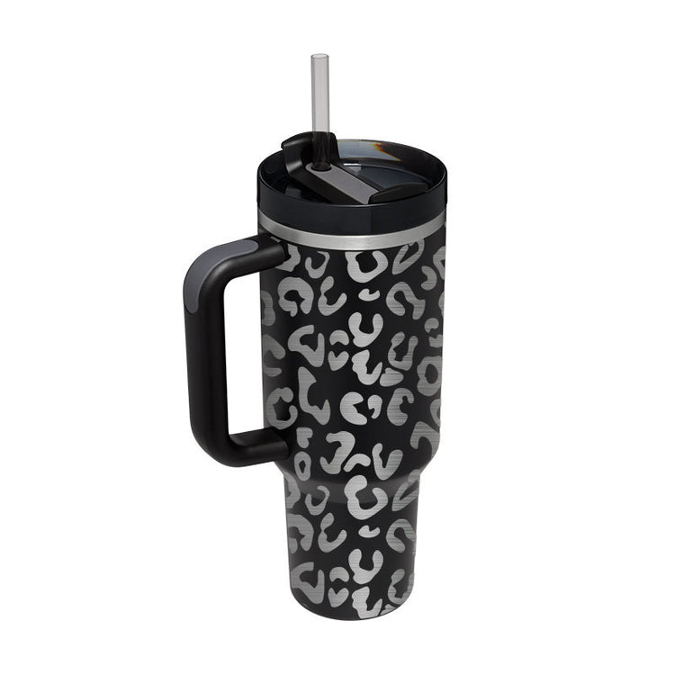 a black and white leopard print coffee mug