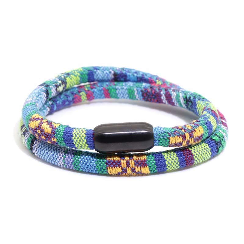 a colorful bracelet with a black bead