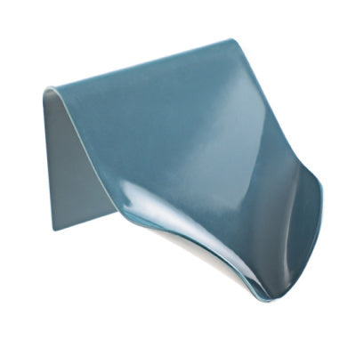 a blue plastic object on a white background