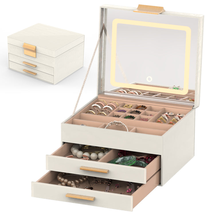 a white jewelry box with a glass lid
